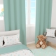 Habitación infantil con Edredón reversible cama naturaleza y mint. Edredón con tejido 100% algodón orgánico con hojas de la naturaleza de varios colores y reversible en mint de Estrellita la Valiente.