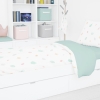 Habitación infantil edredón reversible cama naturaleza y mint. Edredón con tejido 100% algodón orgánico con hojas de la naturaleza de varios colores y reversible en mint de Estrellita la Valiente.